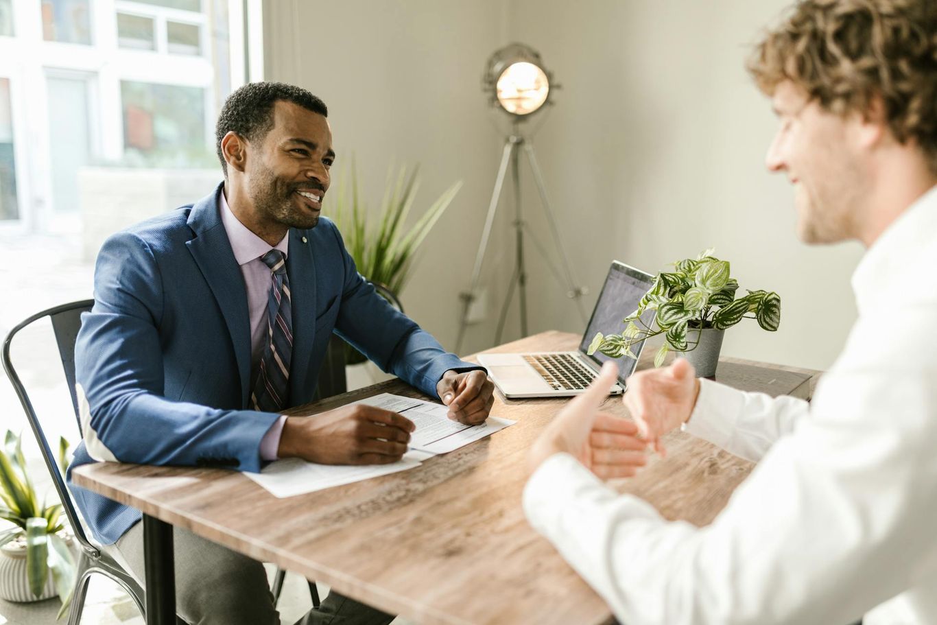 Two business people chatting